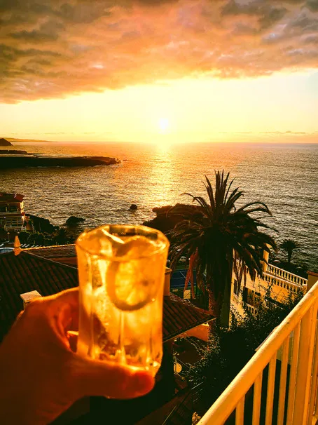 Sunset drink with ocean view